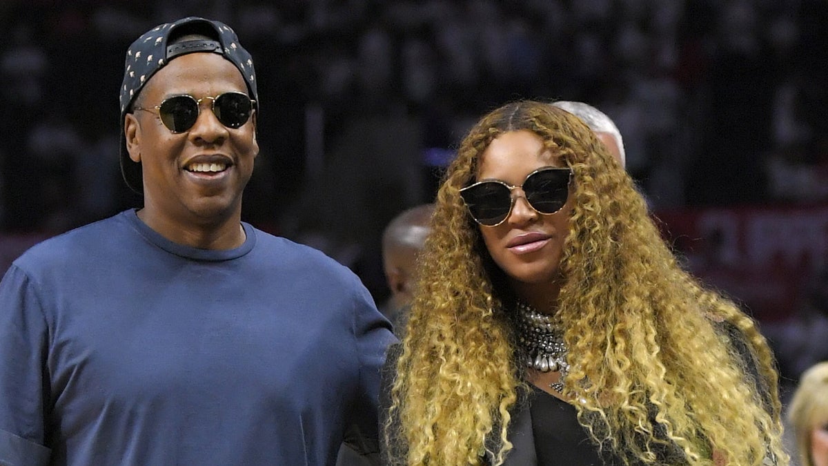 ay Z, left, and Beyoncé.  (AP Photo/Mark J. Terrill, file) 