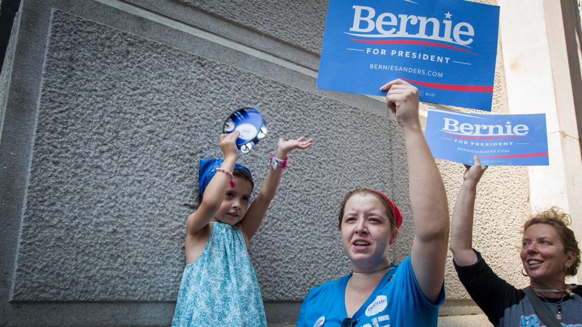 Sanders supporters Renee Bolduc, 35, and her daughter, Ava Lia, 5, chant ''This is what democracy looks ilke'' during a rally at City Hall in Philadelphia on July 25, 2016.