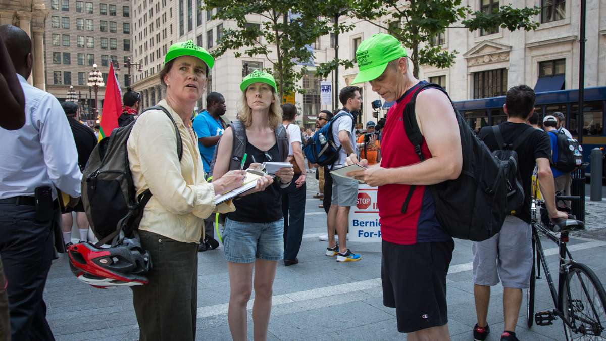 Members of the National Lawyers Guild watch the rallies taking place around City Hall to observe the interactions between protesters and police during the Democratic National Convention July 25th 2016.