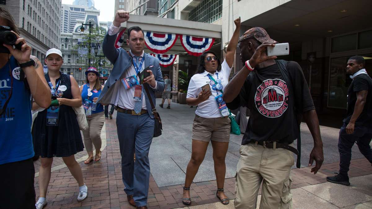 Bernie Sanders delegates happen upon Bernie supporters during a protest near City Hall in Philadelphia July 25, 2016.