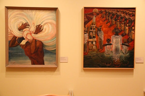 <p>Paintings by Professor Viktor Lowenfeld and his student John Biggers are featured in the National Museum of Jewish History's exhibit about Jewish refugees who found work teaching a black colleges in the Jim Crow south. (Emma Lee/for NewsWorks)</p>
