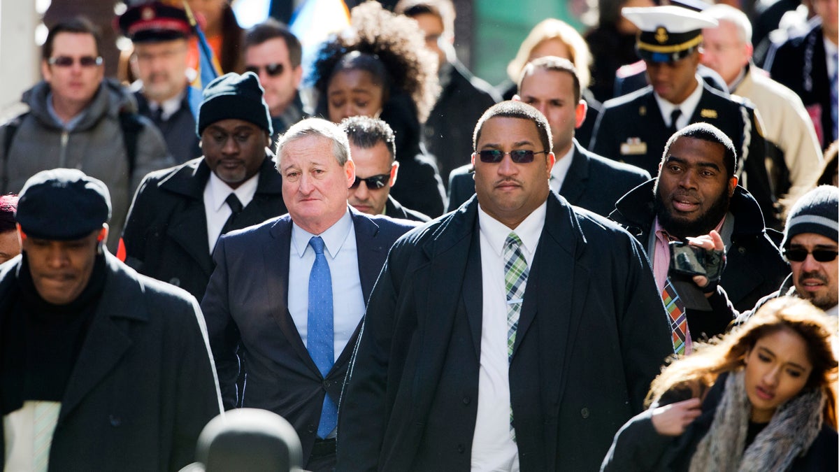  Newly sworn in Philadelphia Mayor Jim Kenney, center left, takes the sidewalk from his inauguration to City Hall Monday, Jan. 4, 2016, in Philadelphia. The 57-year-old Kenney succeeds Michael Nutter, who leaves office after two terms. Kenney served on city council for more than two decades before he was elected in November. (AP Photo/Matt Rourke) 