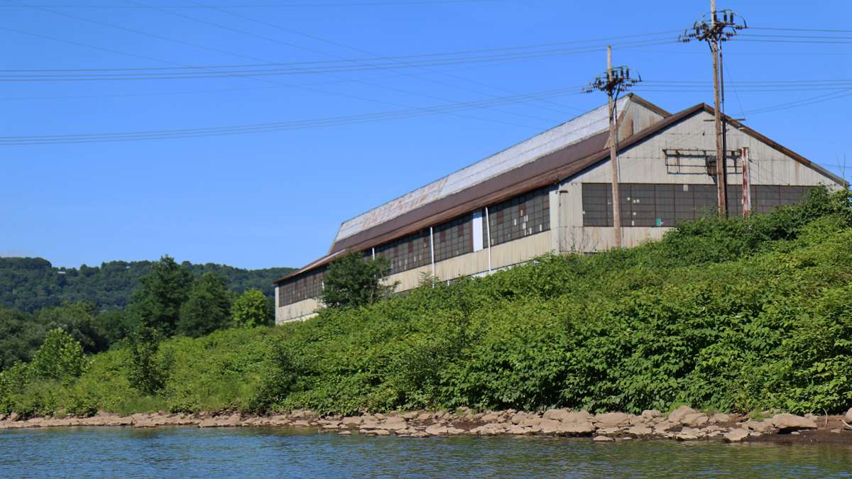 Industrial buildings and shuttered mills can be seen along the banks of the Stonycreek River. (Lindsay Lazarski/WHYY)