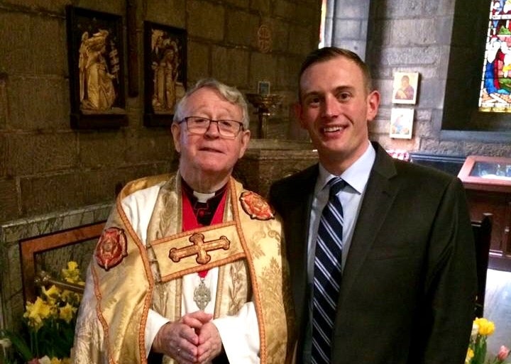  The author, right, stands with a mentor, Father Gordon Reid, at Easter. (Image courtesy of Josh Kruger) 