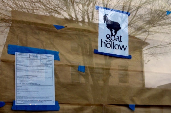 <p>A preview of the Goat Hollow Tavern's new logo is displayed near the building permit. ( Jana Shea /for NewsWorks )</p>
