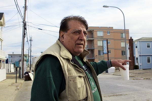 <p>Jay Mazzei remained in town through the storm.  He said he only grew worried when he watched Sandy rip the roof off the Fremont Arms across the street from his home. ( Jana Shea /for NewsWorks )</p>
