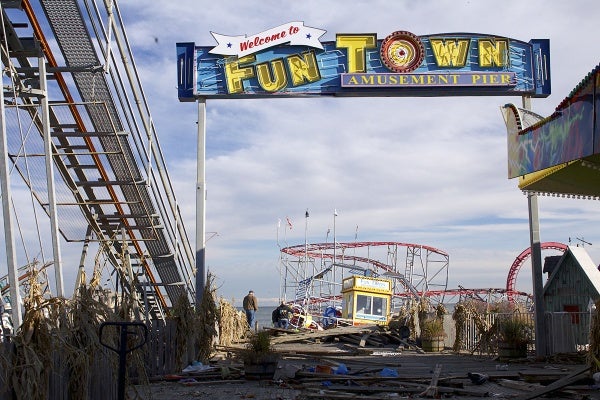 <p>Inspectors survey the damages at Fun Town Pier.( Jana Shea /for NewsWorks )</p>

