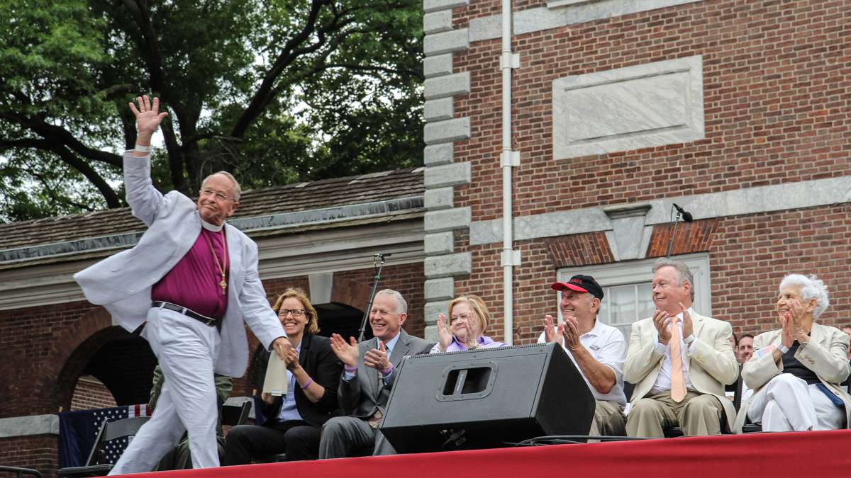 Bishop Gene Robinson takes the stage at Philadelphia's 4th of July celebration of the 50th anniversary of the LGBT civil rights movement. (Kimberly Paynter/WHYY)