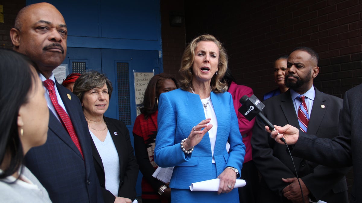 U.S. Senate candidate Katie McGinty speaks with the press after a visit to the struggling E.W. Rhodes School in Philadelphia. (Emma Lee/WHYY)