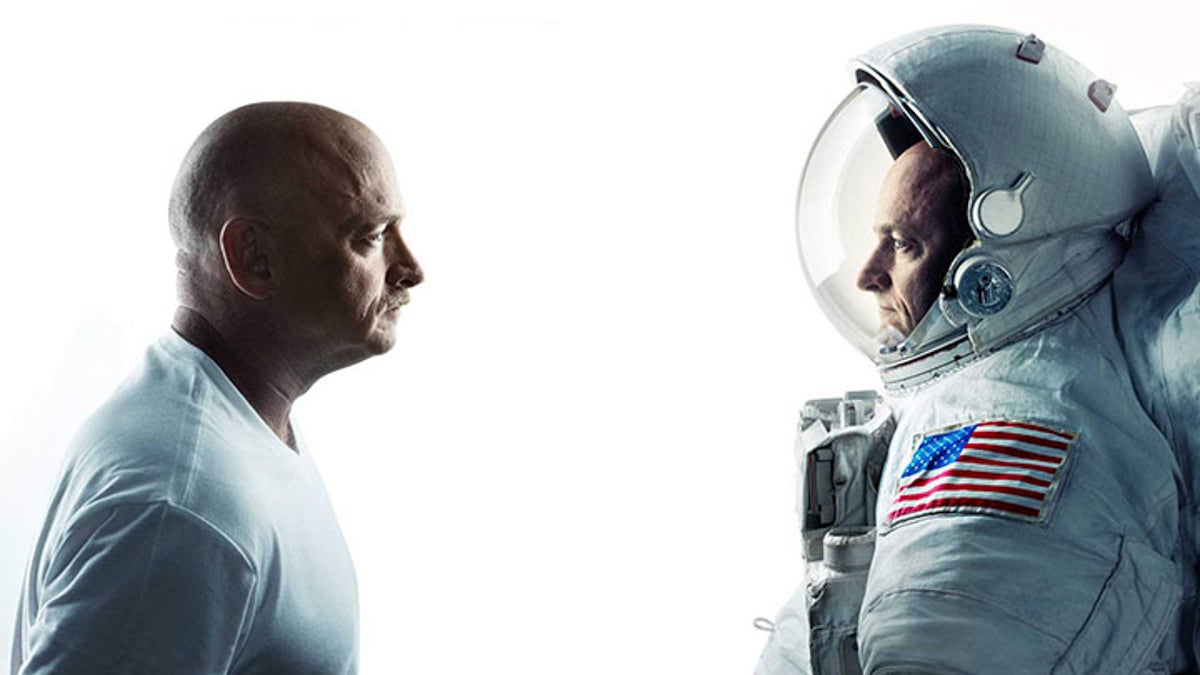  Mark Kelly, left, and his identical twin brother Scott Kelly, right. (<a href=