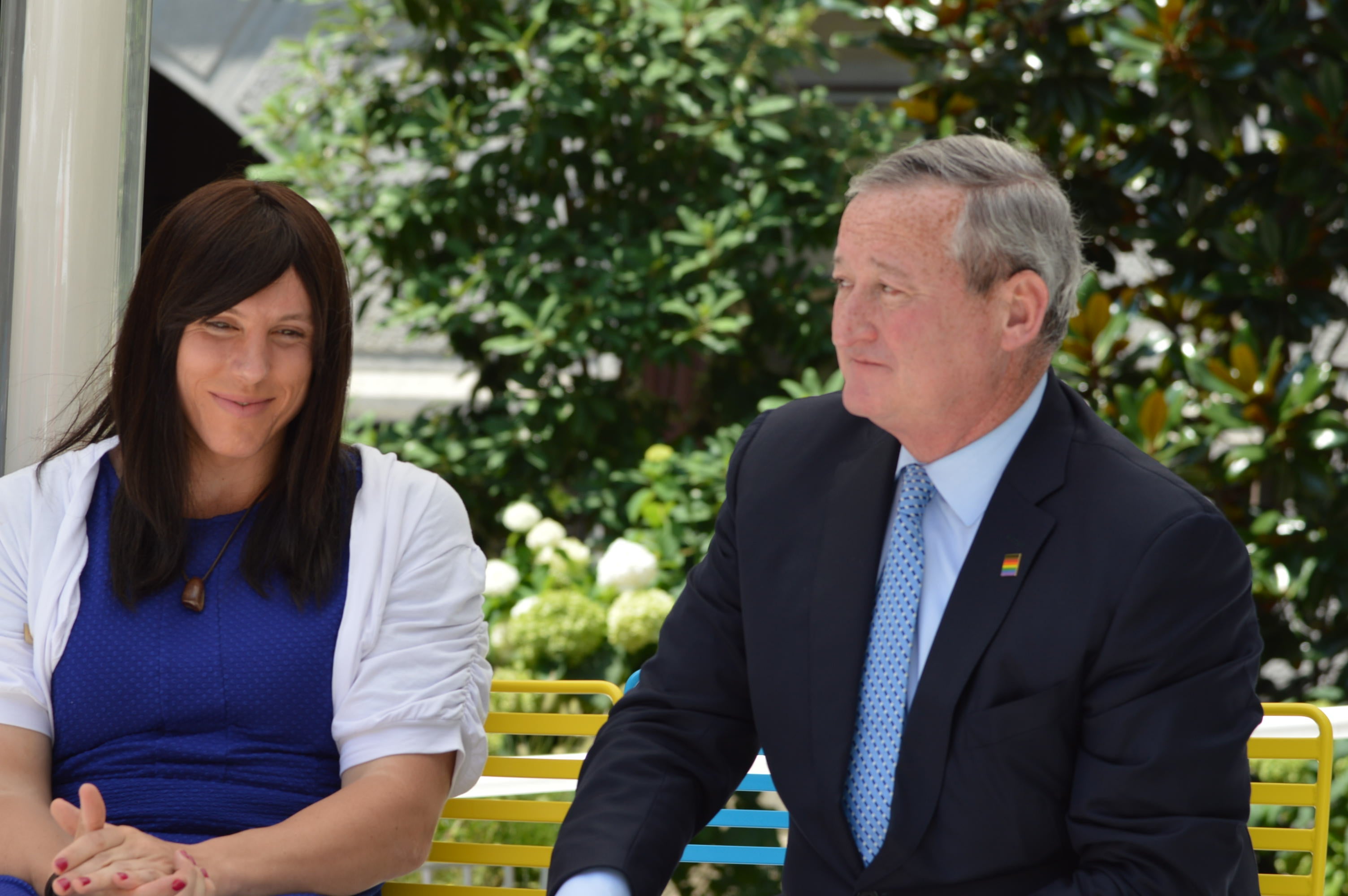  Mayor Jim Kenney speaks with Evelyn Rhynedance, an active duty member of the military, who is also a transgender woman (Tom MacDonald/WHYY) 