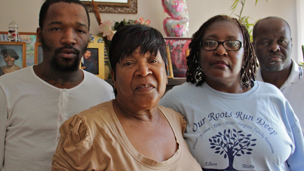  Loretta Davis (second from left) prepares for the homecoming of her son, Kevin Brinkley, who was sentenced to life as a juvenile in 1978. She is supported by (from left) Brinkley's nephew, James Cade, sister, Margo Grisson, and uncle, Greg Brinkley. (Emma Lee/WHYY) 