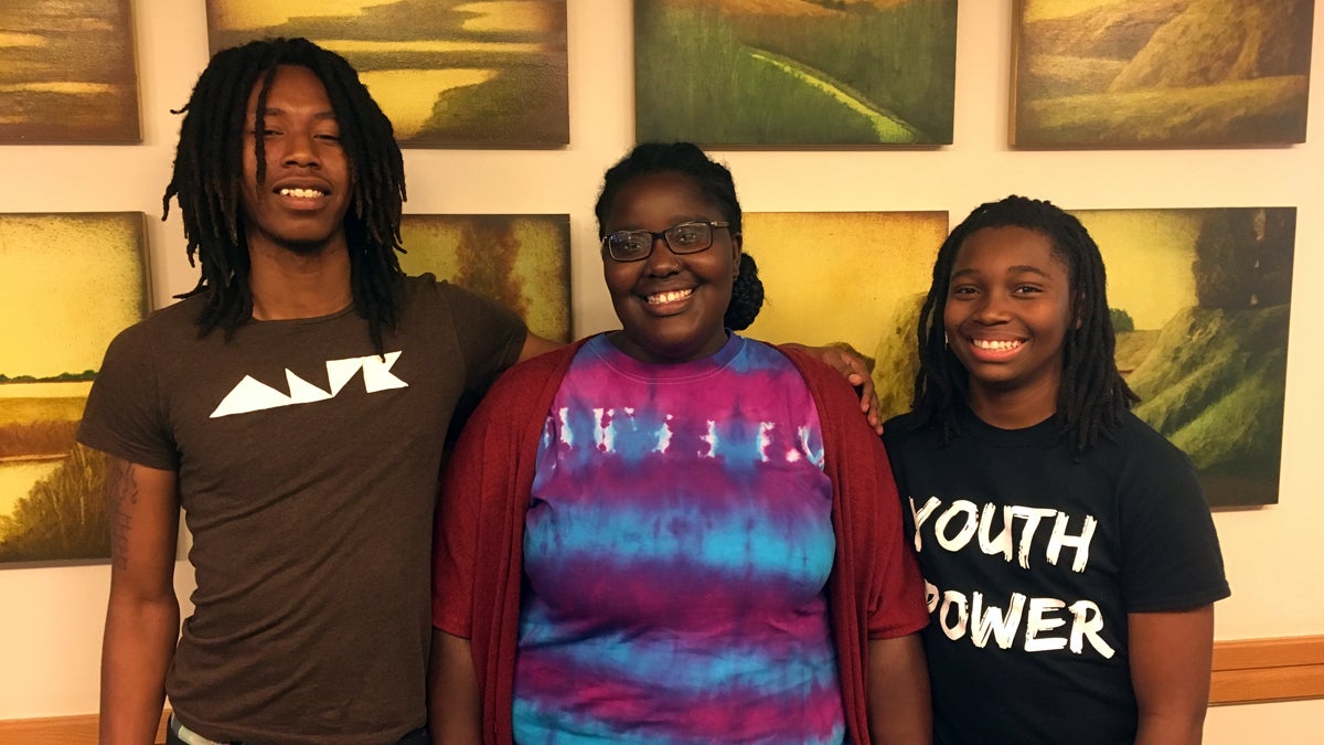  Kevin Dixon, Tre'Cia Gibson, and Jahzaire Sutton work at Rebel Ventures, a youth-centric business that develops healthy snacks served by the School District of Philadelphia and other venues around the city. (Jarrett Stein for NewsWorks) 