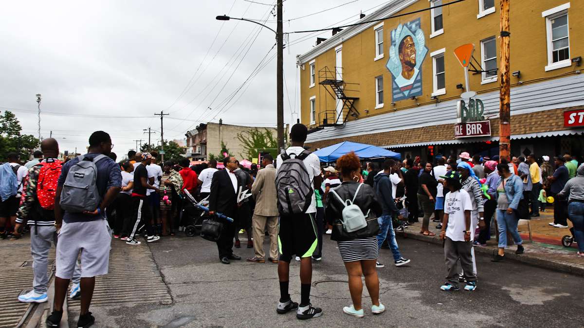 Kevin Hart fans gather to celebrate the comedian on his birthday at the site of the new mural of his likeness at Germantown Ave. and Erie Ave. in North Philadelphia.