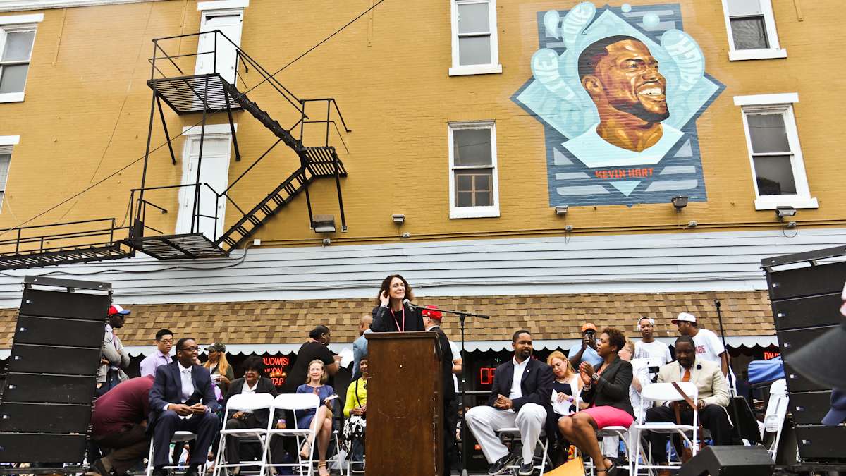 Mural Arts program director Jane Golden speaks at the Kevin Hart Day celebration in North Philadelphia.