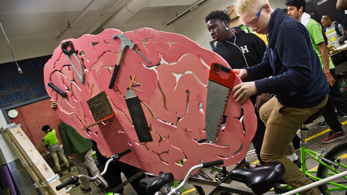  Students at Philadelphia’s Workshop School are constructing a bike for the Kensington Kinetic Sculpture Derby taking place Saturday. (Kimberly Paynter/WHYY) 