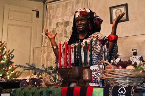 <p><p>Saundra "Momma Sandi" Gilliard, president of African Storytelling group Keepers of the Culture, gives a Kwanzaa presentation at the historic Johnson House in Germantown. (Kimberly Paynter/WHYY)</p></p>
