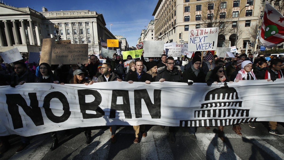  Protesters march from Lafayette Park near the White House in Washington, Saturday, Feb. 4, 2017, during a rally protesting the immigration policies of President Donald Trump. (AP Photo/Manuel Balce Ceneta) 