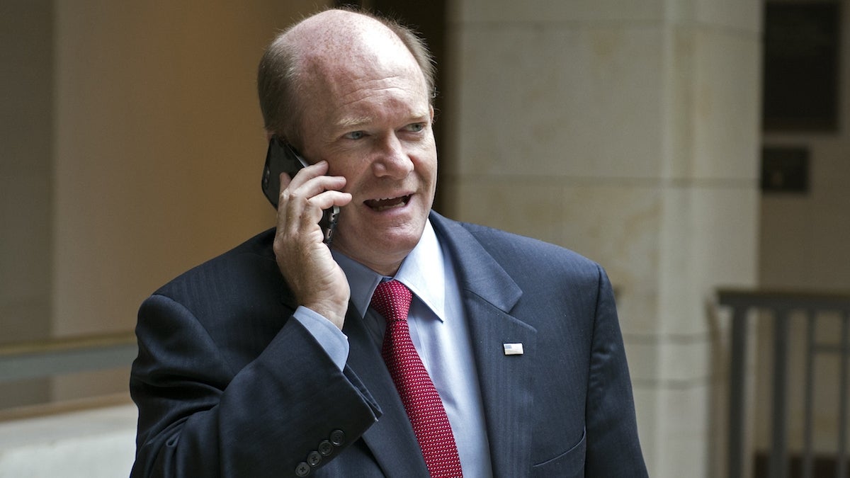  Sen. Chris Coons, D-Del., talks on a phone in Washington, Tuesday, Oct. 27, 2015. (Cliff Owen/AP Photo) 