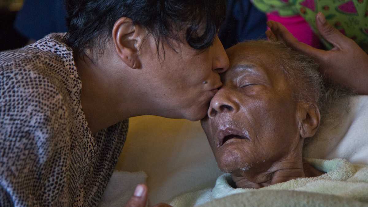  Angela Bobo is the at-home caregiver for her mother, Ruth Perez. (Kimberly Paynter/WHYY) 