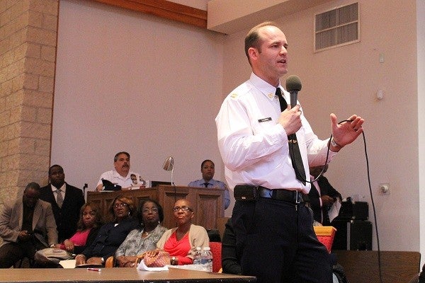  Capt. John Fleming of the 14th Police District speaking to residents at a meeting in May. (Matthew Grady/for NewsWorks, file) 