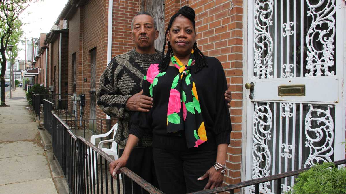  Gerald and Connie Renfrow are among a handful of the original residents who still live on the 6200 block of Osage Avenue. (Emma Lee/WHYY) 
