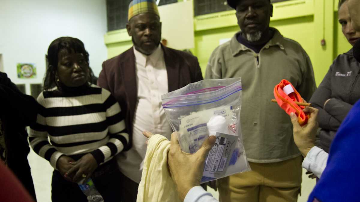  A North Philadelphia program, Fighting Chance, provides community members with the tools and first aid training to help victims after a shooting. (Kimberly Paynter/WHYY) 