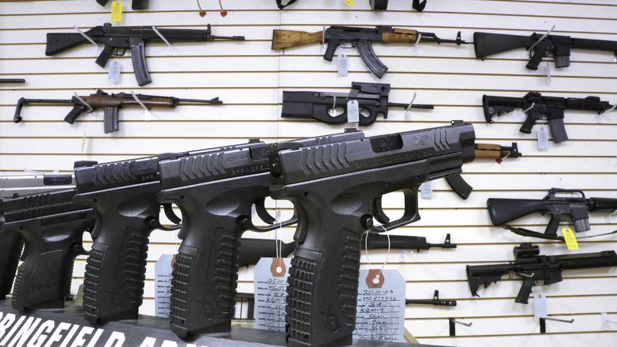  Firearms on display at a gun shop. (Seth Perlman/AP File Photo) 