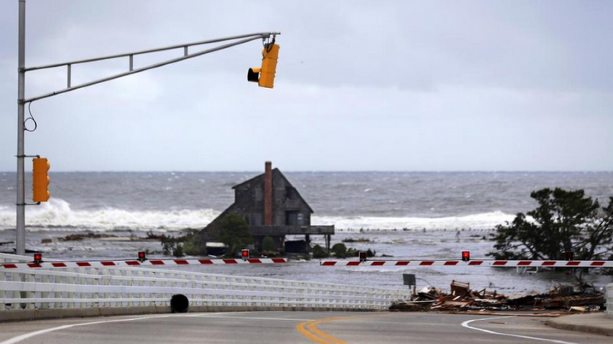 A lone home stood near the Mantoloking Bridge in Mantoloking after Superstorm Sandy's storm surge inundated the area in late October 2012. (Associated Press photo) 