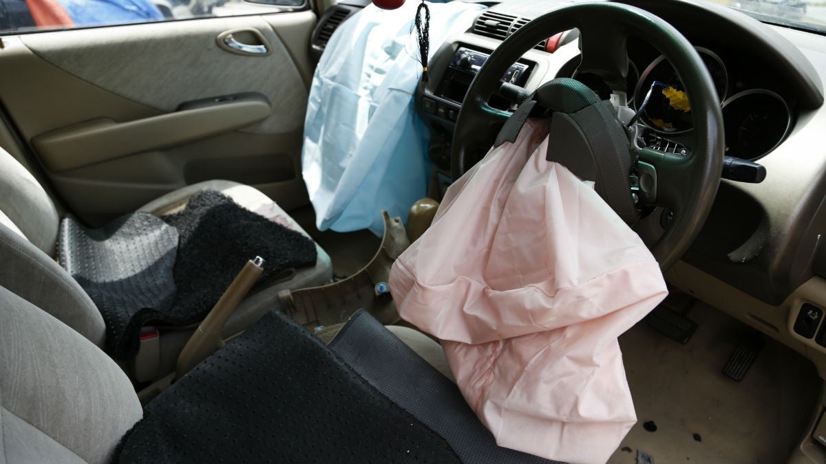  In this Monday, Nov. 7, 2016 photo, the exploded air bag that injured Rabiah binti Ibrahim, hangs from her steering wheel in her Honda City in Slim River, Malaysia. Five Malaysians have died in accidents linked to faulty Takata air bags that are at the center of one of the world’s largest auto recalls. (AP Photo/Lim Huey Teng) 