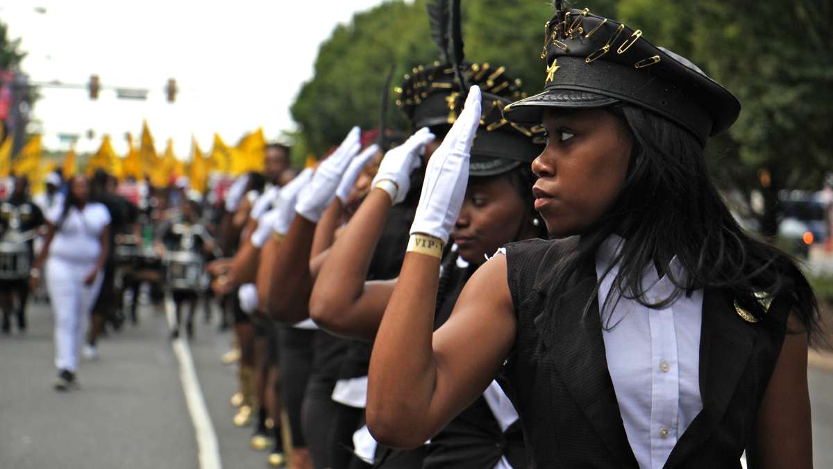 The Modern Legends Drill Team of American Legion Post 224 perform in the Philadelphia Labor Day parade. (Emma Lee/WHYY)