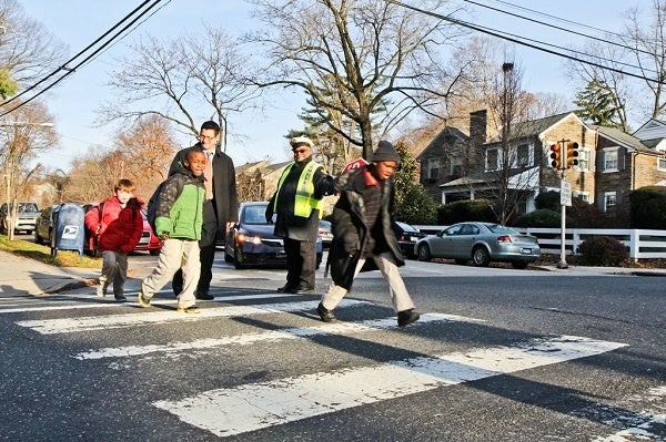 <p><p>A crossing guard at the corner of Conrad St. and Midvale Ave. since 2004, Larry Abney says, "When I started here, they didn't want to stop for you to cross the kids. If you have to be at work at 8, why do you leave at 5 of?" (Kimberly Paynter/WHYY)</p></p>
