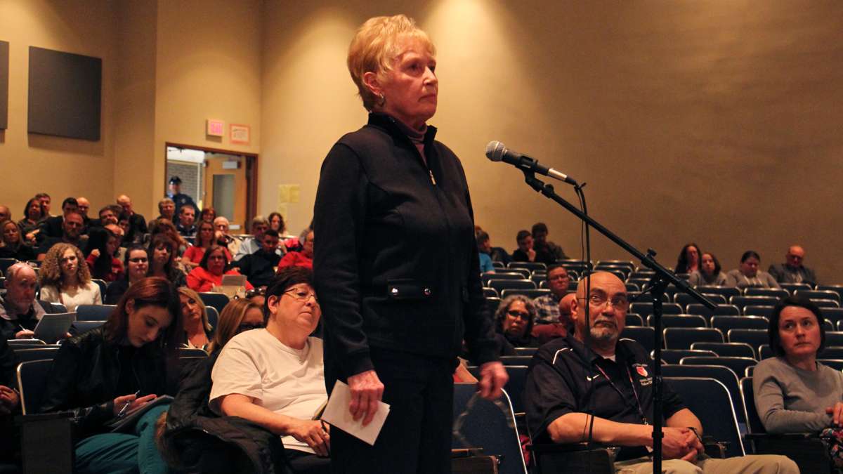 A resident criticizes the board for conducting ''a social eperiment that exposes our students to danger.'' (Emma Lee/WHYY)