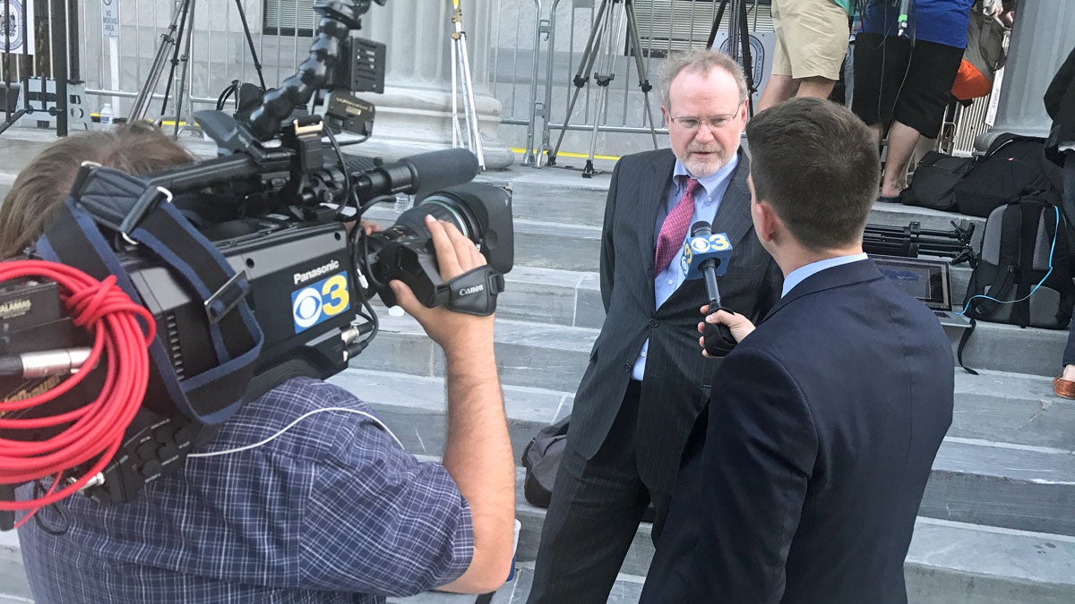  Former prosecutor Dennis McAndrews gives his legal analysis of the Cosby trial. It was among dozens of appearances he's made since offering himself up as an expert to reporters covering the trial. (Bobby Allyn/WHYY) 