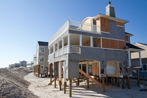 <p><p>A beachfront home is boarded up on Brighton Beach in Long Beach Island nearly two weeks after Hurricane Sandy made landfall on the New Jersey coastline. (Lindsay Lazarski/WHYY)</p></p>
