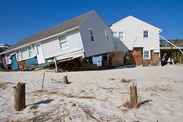 <p><p>Hurricane Sandy's high winds and intense waters sent a neighbor's home crashing into the Hosner's residence at Brighton Beach on Long Beach Island. (Lindsay Lazarski/WHYY)</p></p>

