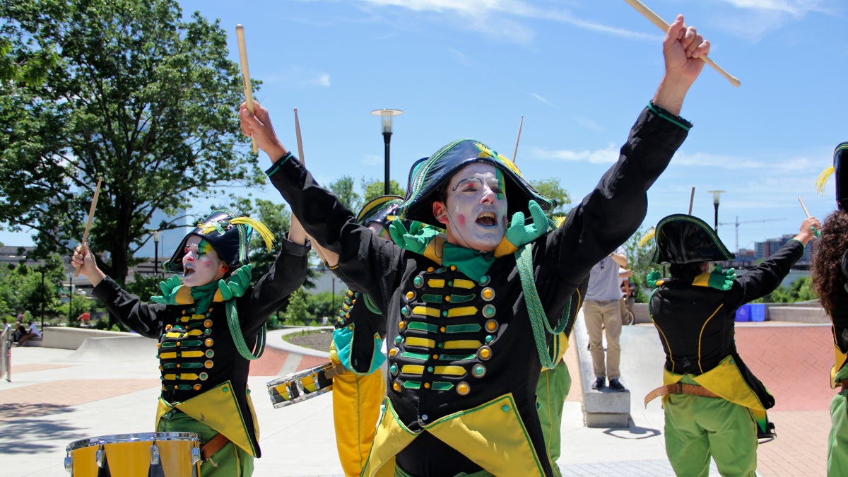 La Compagnie du Transe Express tease their Solstice in the City act with a pop-up performance in Paine Park. (Emma Lee/WHYY)