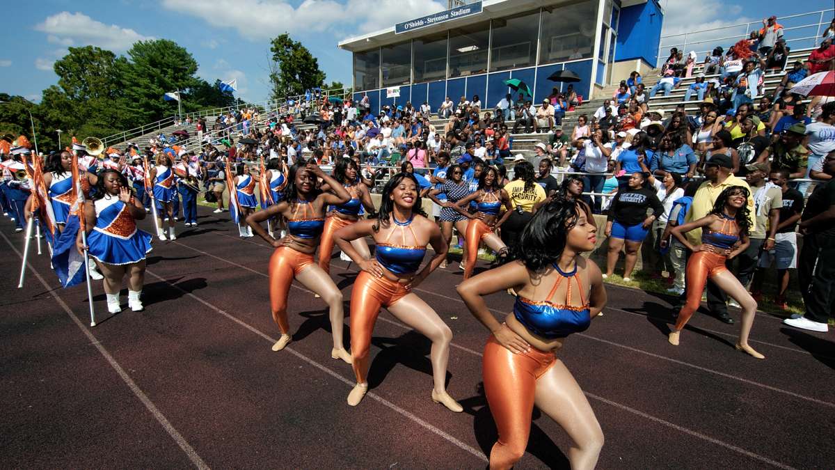 Lincoln University cheerleaders perform in front of the Cheyney stands. Enrollment at Lincoln is up, while Cheyney numbers are falling, but both schools suffer from funding shortages. (Bastiaan Slabbers/for NewsWorks)