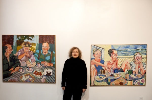 <p><p>Doris Lane Grey standing between her paintings, "Apple Pie Brunch" (left) and "Stone Harbor Brunc" (right) at the Mt. Airy Art Garage. (Brad Larrison/for NewsWorks)</p></p>
