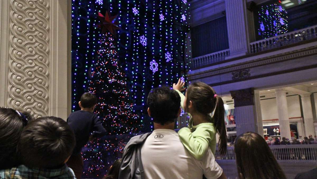  A scene from the 2013 holiday light show at Macy's in Center City. (Kimberly Paynter/WHYY, file) 