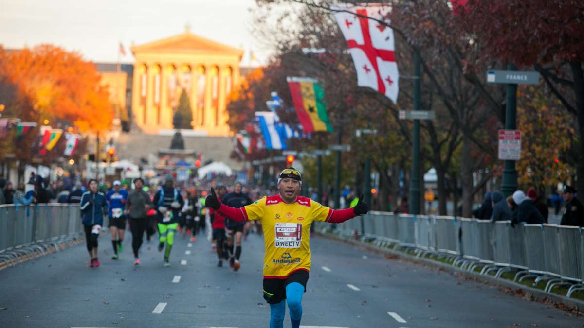 Runners begin the Philadelphia Marathon Sunday.