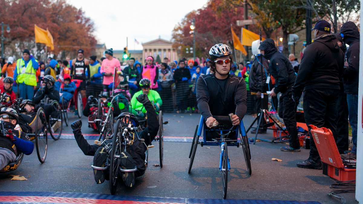 Wheelchair and handcycle competitors wait for the start of the Philadelphia Marathon.