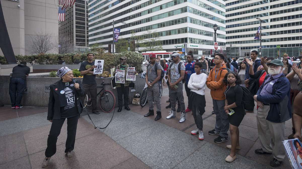 Pam Africa, a member of the MOVE Organization that was famously bombed by the Philadelphia police in 1985, speaks at a rally marking the one year anniversary of the death of Freddie Gray whose spinal cord was severed while in police custody. (Branden Eastwood for NewsWorks)