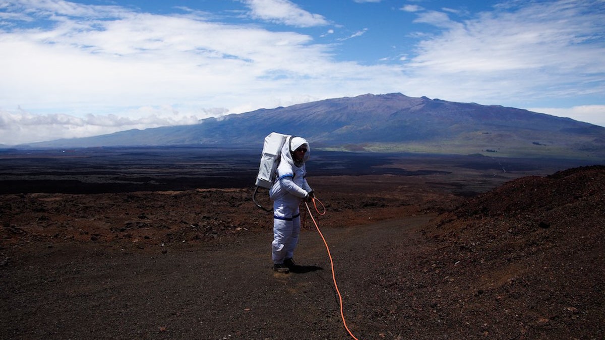  Ross Lockwood on top of a volcano in Hawaii, where he simulated living on mars for months. (Courtesy of Casey Stedmen) 