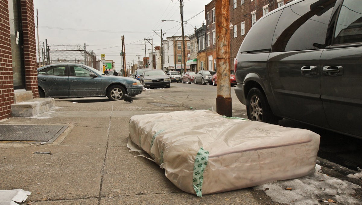  A mattress is wrapped in plastic for pick up in South Philadelphia. (Kimberly Paynter/WHYY) 