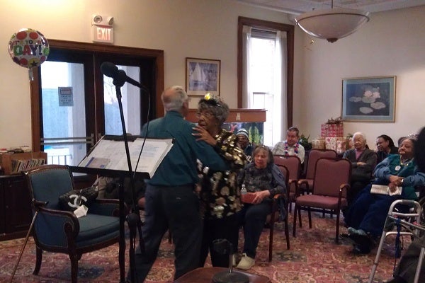 <p><p>Ida McDougal dances to Frank Sinatra's "It Had To Be You" with another Wesley Enhanced Living at Stapely resident. (Yasmein James/for NewsWorks)</p></p>
