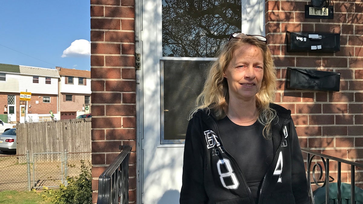 After fending off debt collectors for years, Adrienne McNally, 49, was sued by the federal government over $6,200 in student loans she took out decades ago. There is now a lien from the government on her home in Northeast Philadelphia. (Bobby Allyn/WHYY)