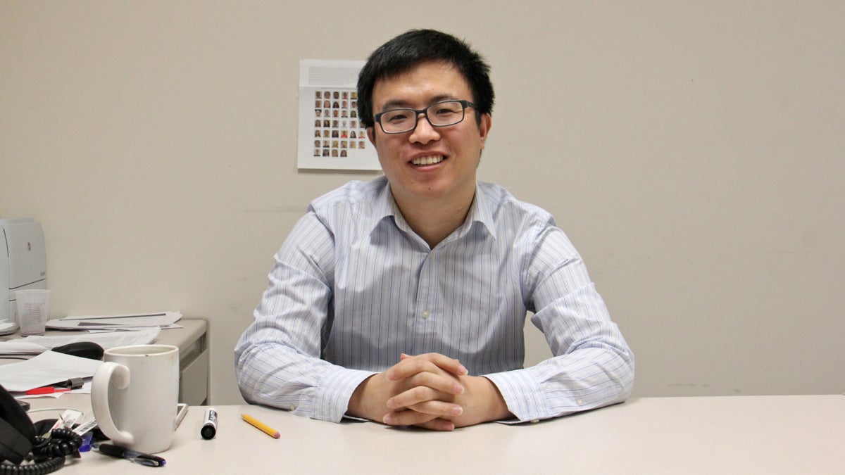  Meng Li, a professor of business science at Rutgers Camden, is an H-1B visa holder. (Emma Lee/WHYY) 