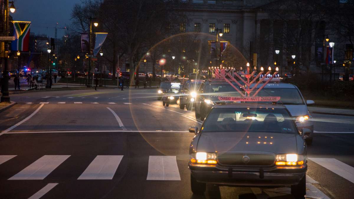 More than 250 cars participate in Philadelphia's 10th Annual Car Menorah Parade December 26, 2016.