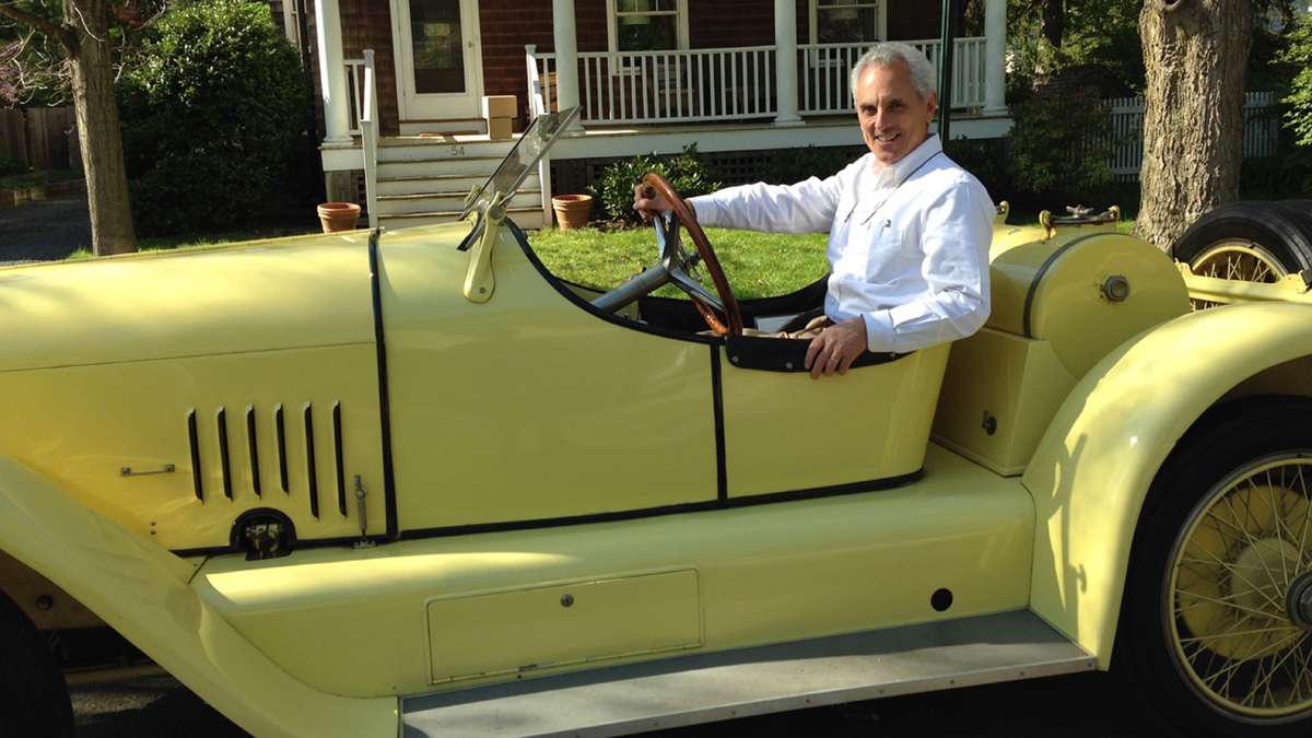 Author Clifford Zink is pictured here in a 1920, canary yellow, L-Head Mercer Raceabout owned by a Princeton, New Jersey vintage car aficionado.